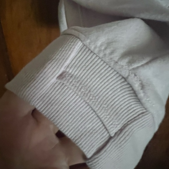 Zip up hoodie with pockets light pink in color - Picture 3 of 3